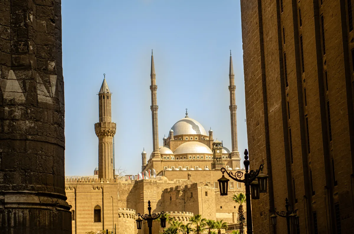 Muhammad Ali Mosque framed by a historic Cairo gateway